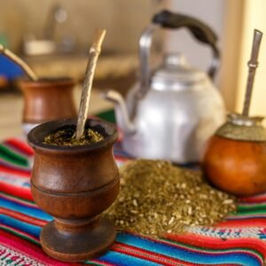 Colorful setup of yerba mate with gourd and bombilla, symbolic of South American tea culture.